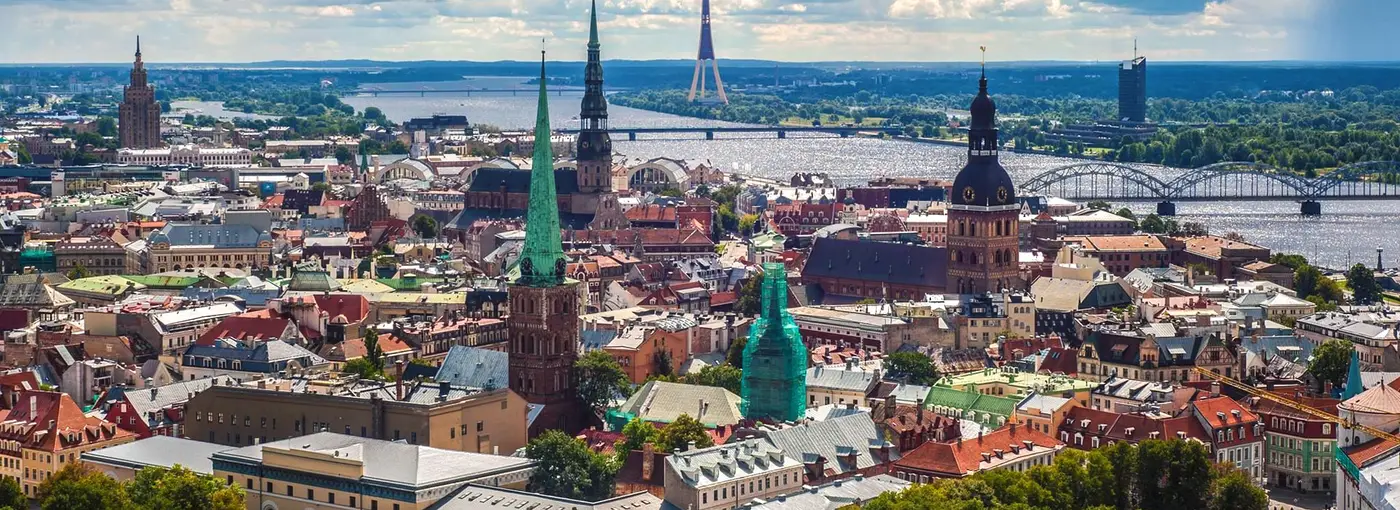 The spires and rooftops of Riga's old town above the Daugava