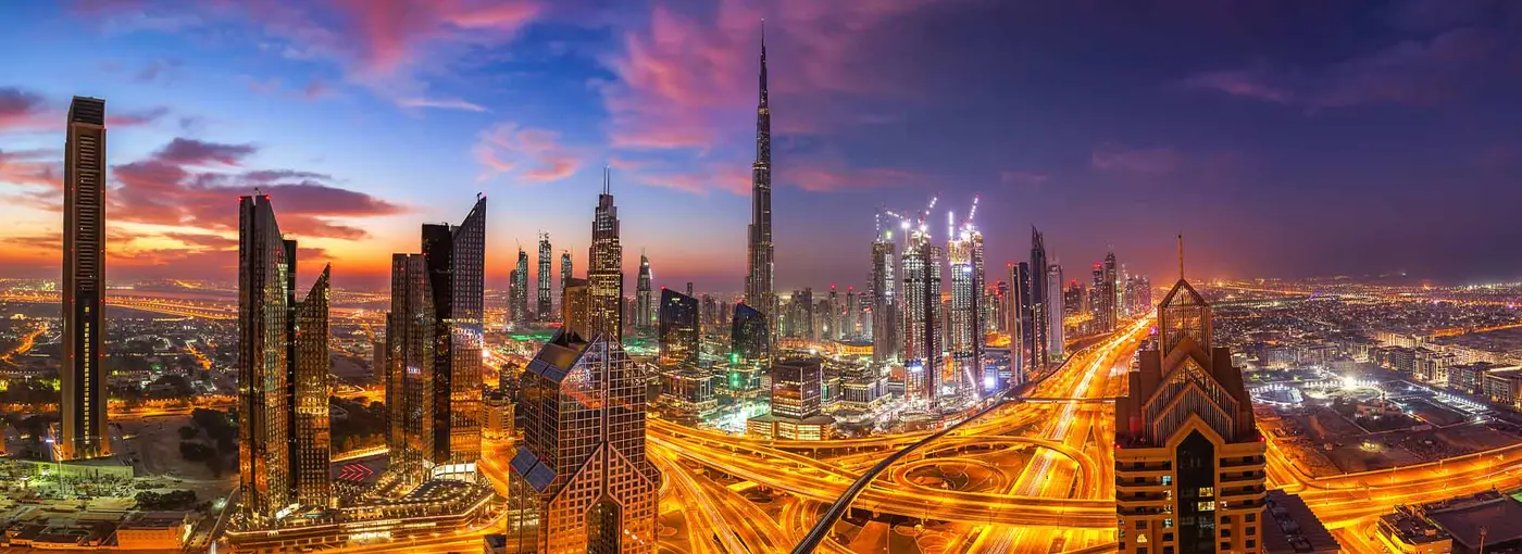 The Dubai skyline at dusk, the Burj Khalifa at its centre